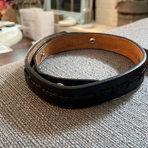 Black belt with buckle loop
